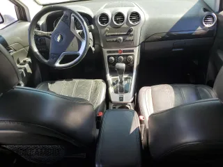 2013 Chevrolet Captiva Sport LTZ with VIN 3GNAL4EK7DS635705, listed as a Copart auction lot 74620694 with 106,998 mi miles and Salvage Title. Bid and sale history available at DreamBid. Image 8.