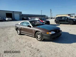 1997 Ford Mustang with VIN 1FALP4043VF174092, listed as a Copart auction lot 86983884 with 105,774 mi miles and Salvage Title. Bid and sale history available at carsss.com. Image 11.