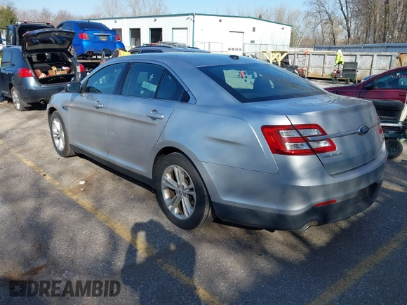 2013 Ford Taurus SEL with VIN 1FAHP2E8XDG191132, listed as a IAAI auction lot 41833542 with 165,125 mi miles. Bid and sale history available at carsss.com. Image 3.