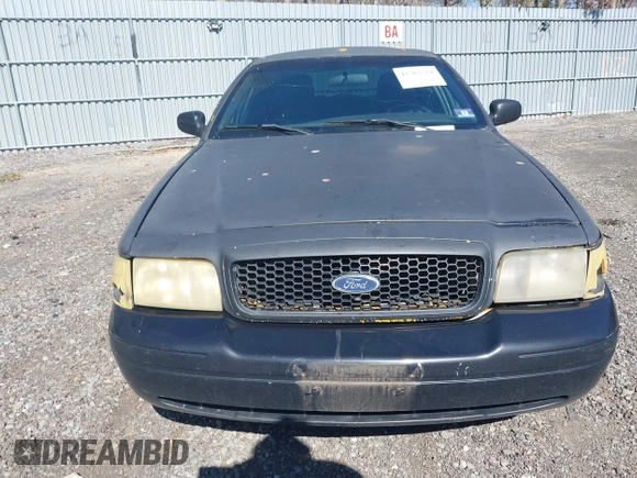 2011 Ford Crown Victoria with VIN 2FABP7AV9BX121739, listed as a IAAI auction lot 41763311 with 215,727 mi miles. Bid and sale history available at carsss.com. Image 12.