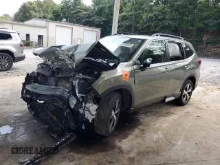 2019 Subaru Forester Touring z VIN JF2SKAWCXKH559894, wystawiony jako Copart lot #62203825 z przebiegiem Nie podano mil oraz Szkoda całkowita • Salvage title. Historia ofert i sprzedaży dostępna na DreamBid. Obrazek 1.