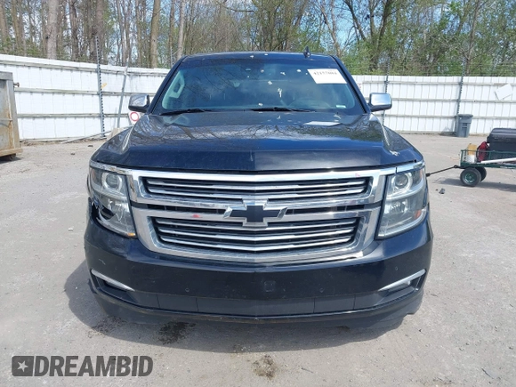 2015 Chevrolet Tahoe LTZ with VIN 1GNSKCKC8FR514671, listed as a IAAI auction lot 42157084 with 182,665 mi miles and . Bid and sale history available at DreamBid. Image 12.