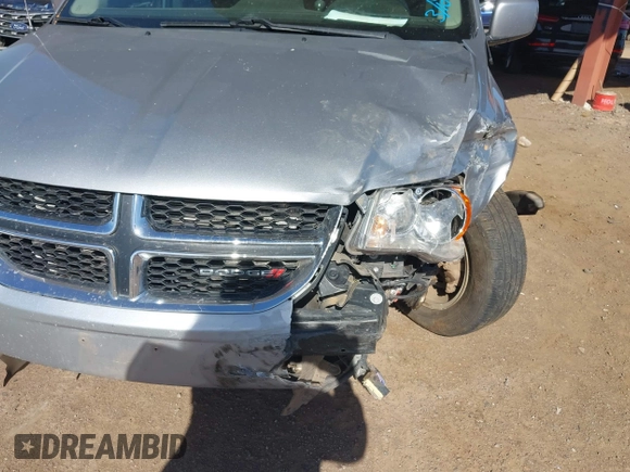 2015 Dodge Grand Caravan SXT with VIN 2C4RDGCG1FR649074, listed as a IAAI auction lot 41759409 with 116,856 mi miles and . Bid and sale history available at DreamBid. Image 6.