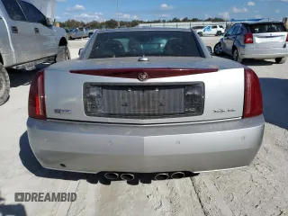 2005 Cadillac XLR z VIN 1G6YV34A455601742, wystawiony jako Copart lot #77878544 z przebiegiem Nie podano mil oraz Szkody całkowita. Historia ofert i sprzedaży dostępna na DreamBid. Obrazek 6.