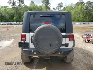 2008 Jeep Wrangler Rubicon z VIN 1J8GA69198L614736, wystawiony jako Copart lot #50826545 z przebiegiem 124 801 mil mil oraz Czysty tytuł • Clean title. Historia ofert i sprzedaży dostępna na DreamBid. Obrazek 6.