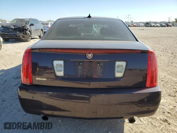 2009 Cadillac STS RWD z VIN 1G6DW67V090167639, wystawiony jako Copart lot #87113674 z przebiegiem 121 498 mil mil oraz Czysty tytuł • Clean title. Historia ofert i sprzedaży dostępna na DreamBid. Obrazek 6.