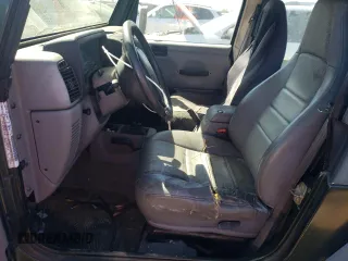 1998 Jeep Wrangler Sport with VIN 1J4FY19S2WP790179, listed as a Copart auction lot 69853294 with 148,675 mi miles and Salvage Title. Bid and sale history available at carsss.com. Image 7.