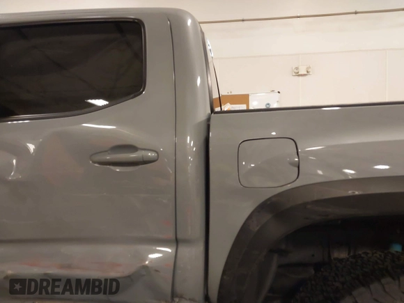 2019 Toyota Tacoma SR z VIN 3TMCZ5AN1KM232360, wystawiony jako IAAI lot #42006355 z przebiegiem 133 909 mil mil oraz . Historia ofert i sprzedaży dostępna na DreamBid. Obrazek 12.