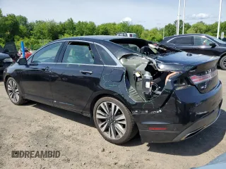 2019 Lincoln MKZ Reserve II z VIN 3LN6L5E90KR607021, wystawiony jako Copart lot #57874945 z przebiegiem 71 061 mil mil oraz Szkoda całkowita • Salvage title. Historia ofert i sprzedaży dostępna na DreamBid. Obrazek 2.