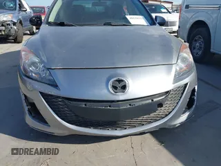 2010 Mazda 3 i SV with VIN JM1BL1SF4A1148543, listed as a IAAI auction lot 40110323 with 131,801 mi miles and . Bid and sale history available at DreamBid. Image 15.