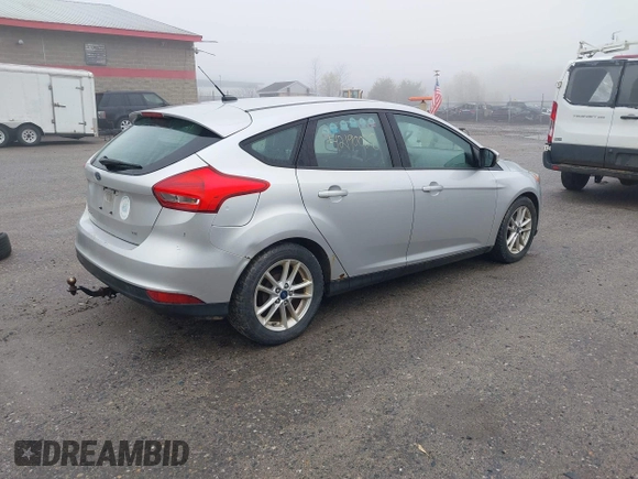 2015 Ford Focus SE with VIN 1FADP3K2XFL364856, listed as a IAAI auction lot 42190028 with 170,436 mi miles. Bid and sale history available at carsss.com. Image 4.