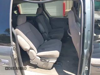 2003 Chrysler Town & Country LX with VIN 2C4GP44R53R385043, listed as a IAAI auction lot 42130516 with 252,056 mi miles. Bid and sale history available at carsss.com. Image 8.
