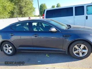 2015 Kia Optima LX with VIN KNAGM4A79F5547332, listed as a IAAI auction lot 42711552 with 154,318 mi miles and . Bid and sale history available at DreamBid. Image 6.