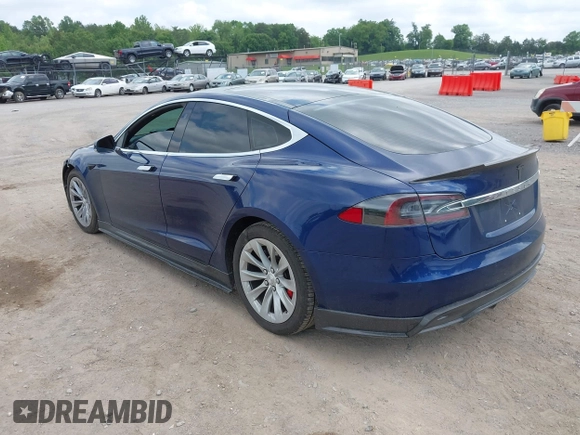 2016 Tesla Model S 90D with VIN 5YJSA1E4XGF168165, listed as a IAAI auction lot 42220139 with Not provided miles and . Bid and sale history available at DreamBid. Image 3.