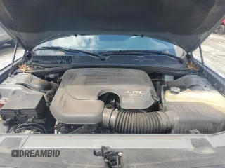 2019 Dodge Challenger SXT z VIN 2C3CDZAG5KH604003, wystawiony jako Copart lot #56694895 z przebiegiem 63 409 mil mil oraz Szkoda całkowita • Salvage title. Historia ofert i sprzedaży dostępna na DreamBid. Obrazek 11.