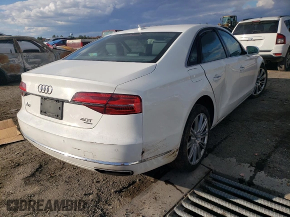 2015 Audi A8 4.0T with VIN WAUJ2AFD3FN005524, listed as a Copart auction lot 65610982 with 105,627 mi miles and . Bid and sale history available at DreamBid. Image 4.