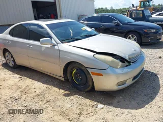 2002 Lexus ES 300 with VIN JTHBF30G720087113, listed as a IAAI auction lot 42667094 with Not provided miles and . Bid and sale history available at DreamBid. Image 1.