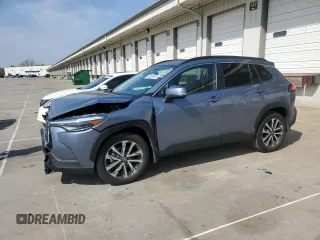 2023 Toyota Corolla Cross XLE with VIN 7MUDAAAG6PV040497, listed as a Copart auction lot 53076975 with 23,066 mi miles and Salvage title. Bid and sale history available at DreamBid. Image 1.
