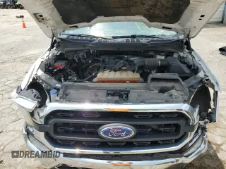 2022 Ford F-150 XL with VIN 1FTFW1E52NKD58571, listed as a Copart auction lot 60431965 with 66,170 mi miles and Salvage title. Bid and sale history available at DreamBid. Image 11.