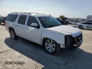 2014 GMC Yukon XL SLT with VIN 1GKS2KE70ER226972, listed as a Copart auction lot 70776944 with 234,145 mi miles and Salvage Title. Bid and sale history available at carsss.com. Image 4.