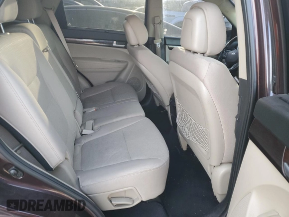 2015 Kia Sorento LX с VIN 5XYKTCA63FG585261, выставлен на аукционе Copart как лот 84011454 с пробегом 148 135 миль миль и Списание • Salvage title. История ставок и продаж доступна на DreamBid. Изображение 11.