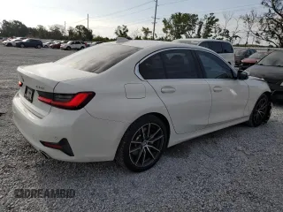 2020 BMW 3 Series 330i with VIN WBA5R1C0XLFH39262, listed as a Copart auction lot 57398585 with 55,456 mi miles and Salvage title. Bid and sale history available at DreamBid. Image 3.