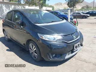 2015 Honda Fit EX-L z VIN 3HGGK5H88FM706513, wystawiony jako IAAI lot #42493772 z przebiegiem 173 129 mil mil oraz . Historia ofert i sprzedaży dostępna na DreamBid. Obrazek 1.