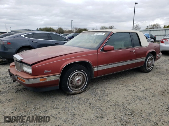 1986 Cadillac Eldorado z VIN 1G6EL5784GU616263, wystawiony jako Copart lot #48741325 z przebiegiem 59 213 mil mil oraz Tytuł czysty. Historia ofert i sprzedaży dostępna na DreamBid. Obrazek 1.