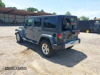 2014 Jeep Wrangler Unlimited Sahara with VIN 1C4BJWEG5EL326980, listed as a IAAI auction lot 42031659 with 116,181 mi miles and . Bid and sale history available at DreamBid. Image 3.