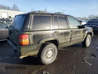 1998 Jeep Grand Cherokee Limited with VIN 1J4GZ78S0WC138917, listed as a Copart auction lot 86223974 with 152,482 mi miles and Clean Title. Bid and sale history available at carsss.com. Image 3.