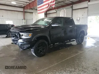2020 Ram 1500 Rebel with VIN 1C6SRFLT0LN195524, listed as a Copart auction lot 64564445 with 57,109 mi miles and Salvage title. Bid and sale history available at DreamBid. Image 1.