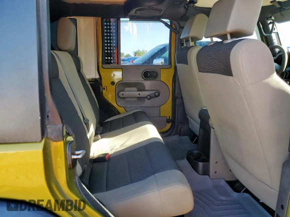 2007 Jeep Wrangler Unlimited X with VIN 1J4GB39197L207883, listed as a Copart auction lot 58778195 with 173,262 mi miles and Salvage title. Bid and sale history available at DreamBid. Image 11.