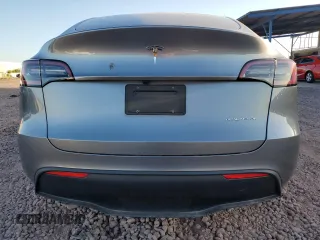 2024 Tesla Model Y Long Range z VIN 7SAYGAEEXRF211507, wystawiony jako Copart lot #56432715 z przebiegiem Nie podano mil oraz Szkoda całkowita • Salvage title. Historia ofert i sprzedaży dostępna na DreamBid. Obrazek 6.