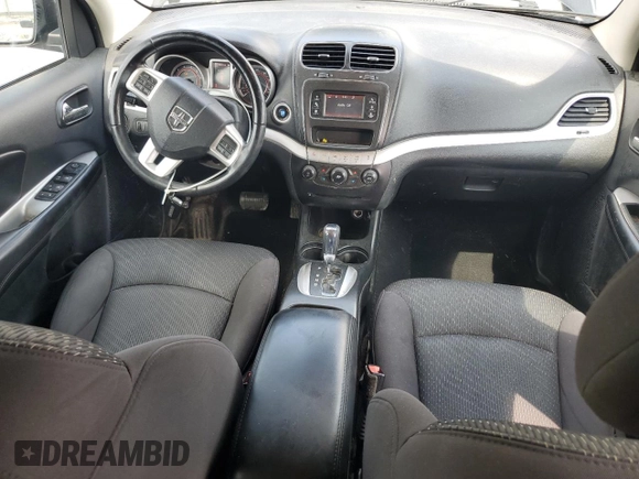 2013 Dodge Journey SXT with VIN 3C4PDDBG0DT532765, listed as a Copart auction lot 61481335 with 193,066 mi miles and Salvage title. Bid and sale history available at DreamBid. Image 8.