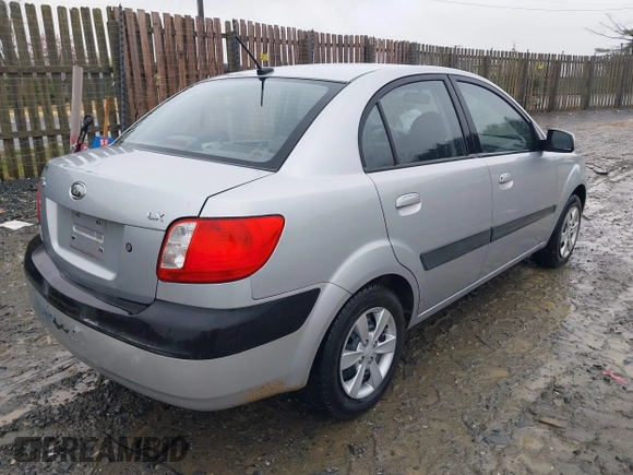 2009 Kia Rio SX with VIN KNADE223596538965, listed as a IAAI auction lot 42029409 with 143,794 mi miles. Bid and sale history available at carsss.com. Image 4.