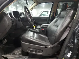 2010 Mercury Mountaineer Premier with VIN 4M2EN4JE2AUJ04373, listed as a Copart auction lot 72208054 with 125,572 mi miles and Salvage Title. Bid and sale history available at carsss.com. Image 7.