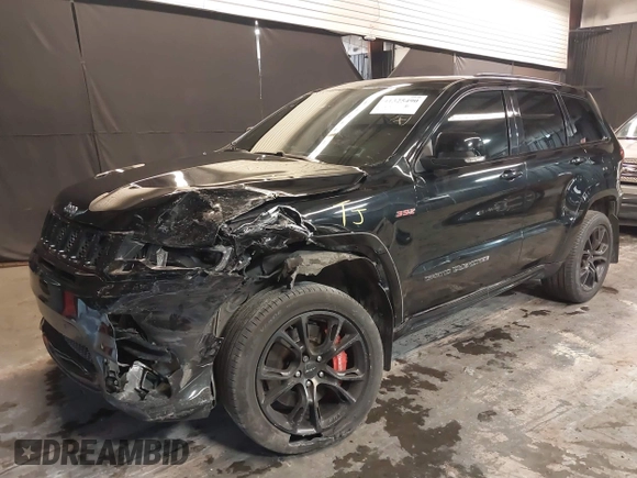 2017 Jeep Grand Cherokee SRT with VIN 1C4RJFDJ9HC819478, listed as a IAAI auction lot 41325490 with 63,551 mi miles. Bid and sale history available at carsss.com. Image 6.