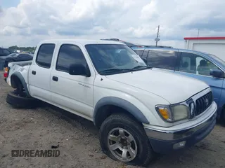 2001 Toyota Tacoma PreRunner z VIN 5TEGN92N11Z805360, wystawiony jako IAAI lot #42128006 z przebiegiem 295 381 mil mil oraz . Historia ofert i sprzedaży dostępna na DreamBid. Obrazek 1.