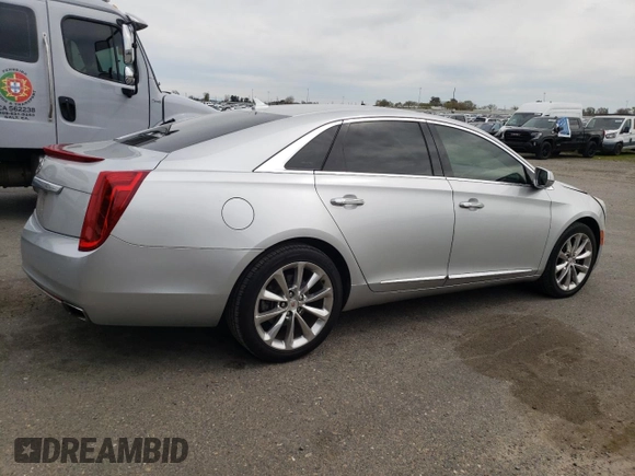 2014 Cadillac XTS Luxury with VIN 2G61M5S31E9217117, listed as a Copart auction lot 49659075 with 104,988 mi miles and Salvage Title. Bid and sale history available at DreamBid. Image 3.