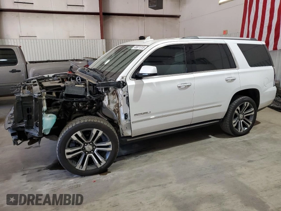 2020 GMC Yukon Denali with VIN 1GKS1CKJ3LR107335, listed as a Copart auction lot 49971315 with 139,967 mi miles and Salvage Title. Bid and sale history available at carsss.com. Image 1.