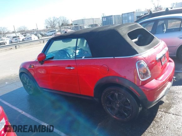 2009 MINI Convertible with VIN WMWMR33569TU95961, listed as a IAAI auction lot 41689845 with 107,934 mi miles and . Bid and sale history available at DreamBid. Image 14.