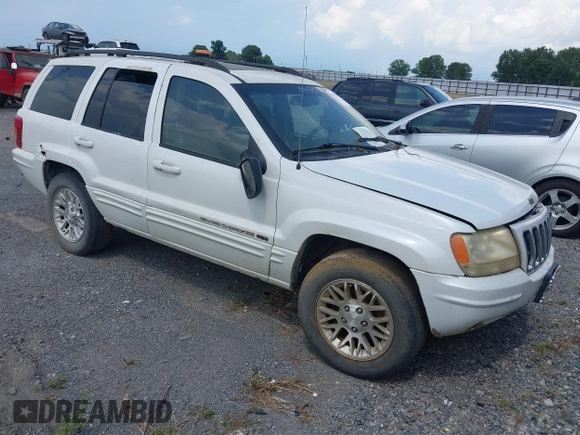 2002 Jeep Grand Cherokee Limited z VIN 1J4GX58N62C195783, wystawiony jako IAAI lot #42745397 z przebiegiem 242 502 mil mil oraz . Historia ofert i sprzedaży dostępna na DreamBid. Obrazek 1.