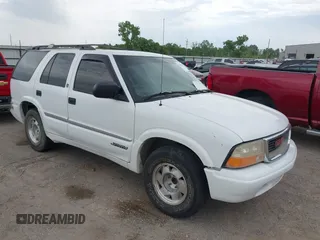 2001 GMC Jimmy SLE z VIN 1GKCS13W312208879, wystawiony jako IAAI lot #42284916 z przebiegiem 204 219 mil mil oraz . Historia ofert i sprzedaży dostępna na DreamBid. Obrazek 1.
