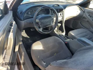 1997 Ford Mustang with VIN 1FALP4043VF174092, listed as a Copart auction lot 86983884 with 105,774 mi miles and Salvage Title. Bid and sale history available at carsss.com. Image 8.
