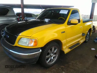 2002 Ford F-150 XL with VIN 1FTRF07L52KB68889, listed as a IAAI auction lot 39266273 with 84,900 mi miles and . Bid and sale history available at DreamBid. Image 2.