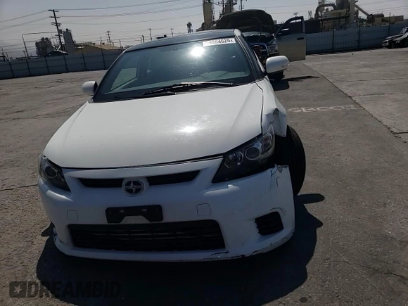 2013 Scion tC z VIN JTKJF5C77D3063067, wystawiony jako Copart lot #54264625 z przebiegiem 74 351 mil mil oraz Szkoda całkowita • Salvage title. Historia ofert i sprzedaży dostępna na DreamBid. Obrazek 13.