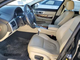 2014 Jaguar XF SC with VIN SAJWA0EX3E8U29494, listed as a Copart auction lot 76844324 with 103,776 mi miles and Clean Title. Bid and sale history available at DreamBid. Image 7.