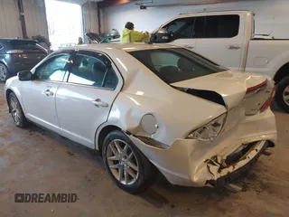2012 Ford Fusion SEL with VIN 3FAHP0JGXCR128976, listed as a IAAI auction lot 41721468 with 115,277 mi miles. Bid and sale history available at carsss.com. Image 3.