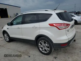 2014 Ford Escape Titanium с VIN 1FMCU0J97EUB15513, выставлен на аукционе Copart как лот 57391715 с пробегом 125 851 миль миль и Списание • Salvage title. История ставок и продаж доступна на DreamBid. Изображение 2.