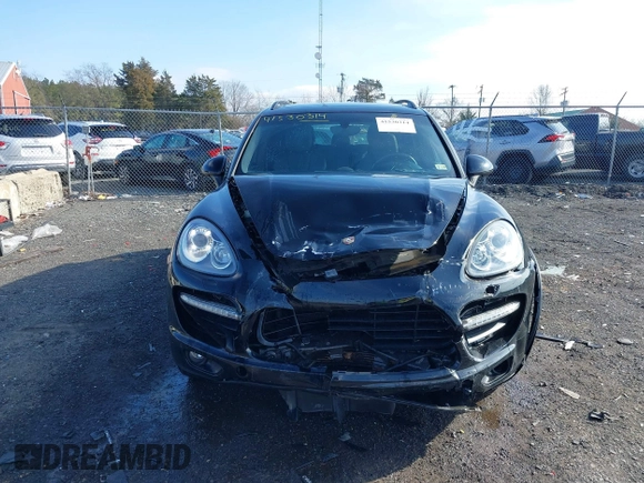 2012 Porsche Cayenne Turbo z VIN WP1AC2A23CLA84310, wystawiony jako IAAI lot #41530314 z przebiegiem 103 859 mil mil oraz . Historia ofert i sprzedaży dostępna na DreamBid. Obrazek 12.